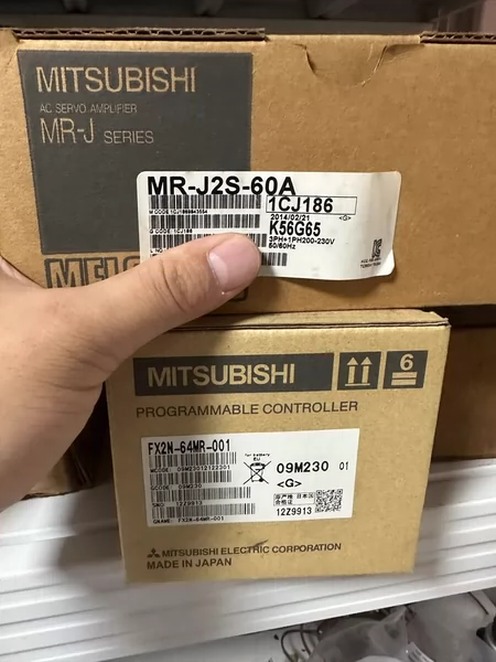 Mitsubishi PLC model MR-J2S-60A FX2N-64MR